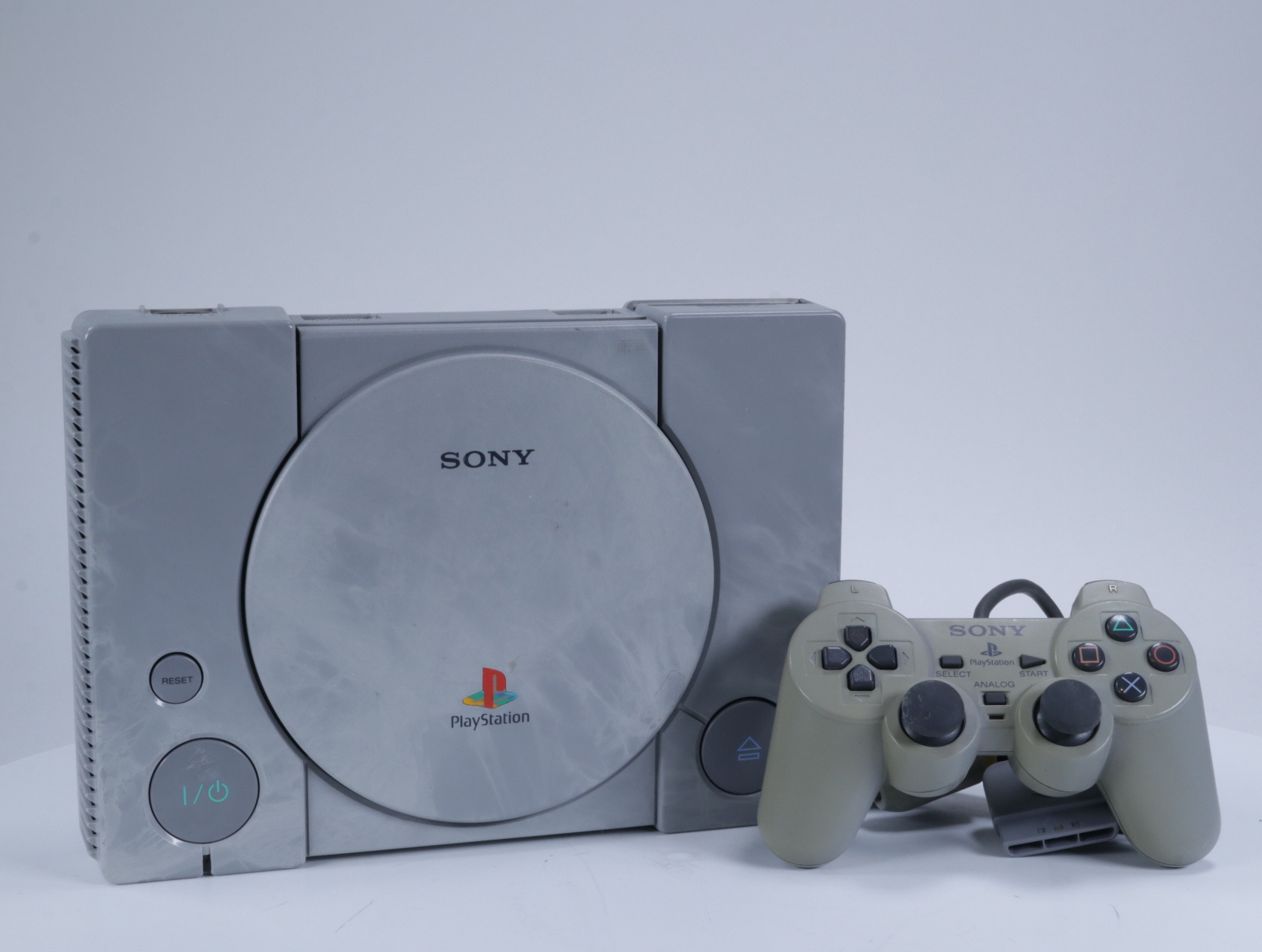 Playstation 1 - Console [DualShock Controller Verkleurt]